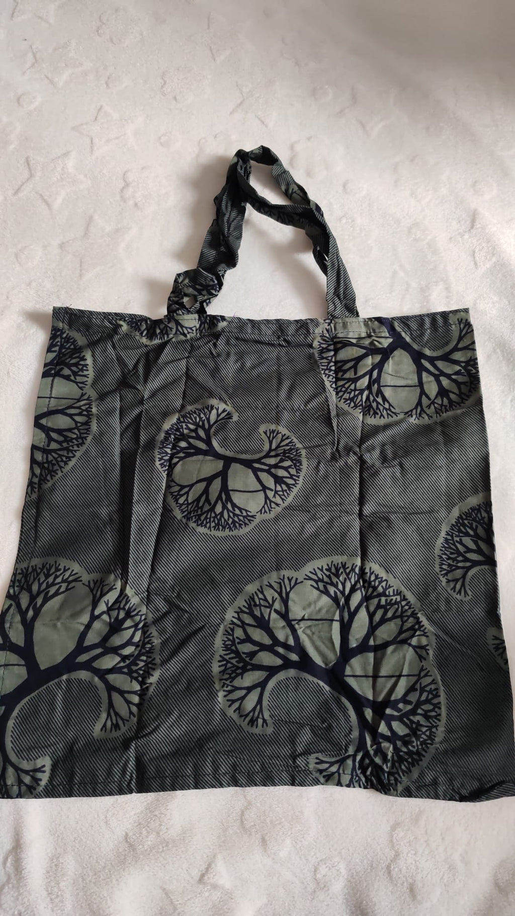 Sac de courses surprise forme demi-lune