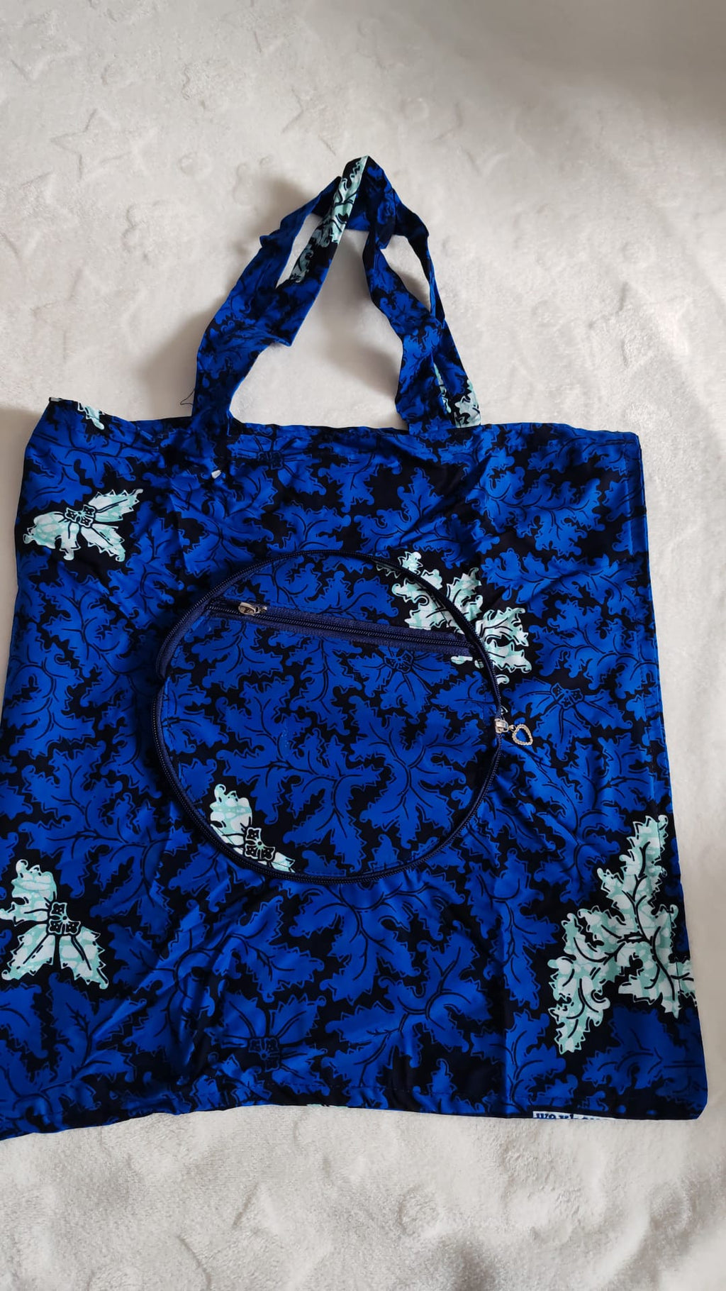 Sac de courses surprise forme demi-lune